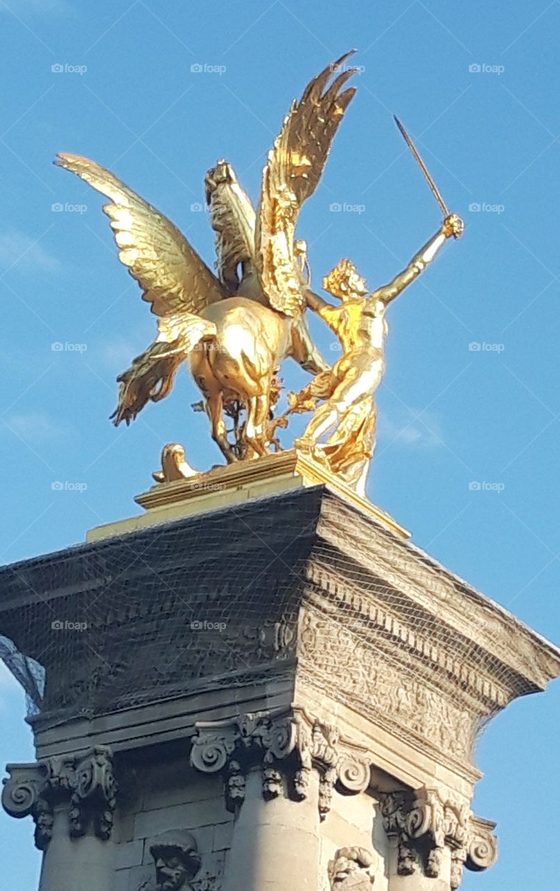 Paris golden statue on Pont Alexandre III