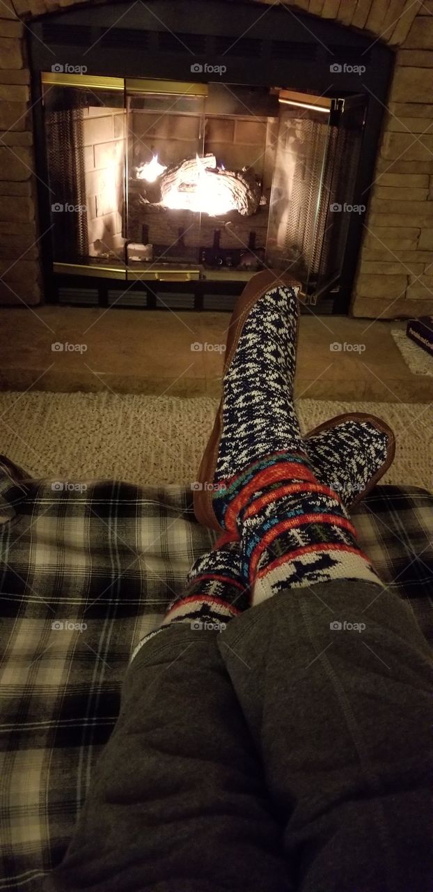 Relaxing by the fire with my Acorn slippers