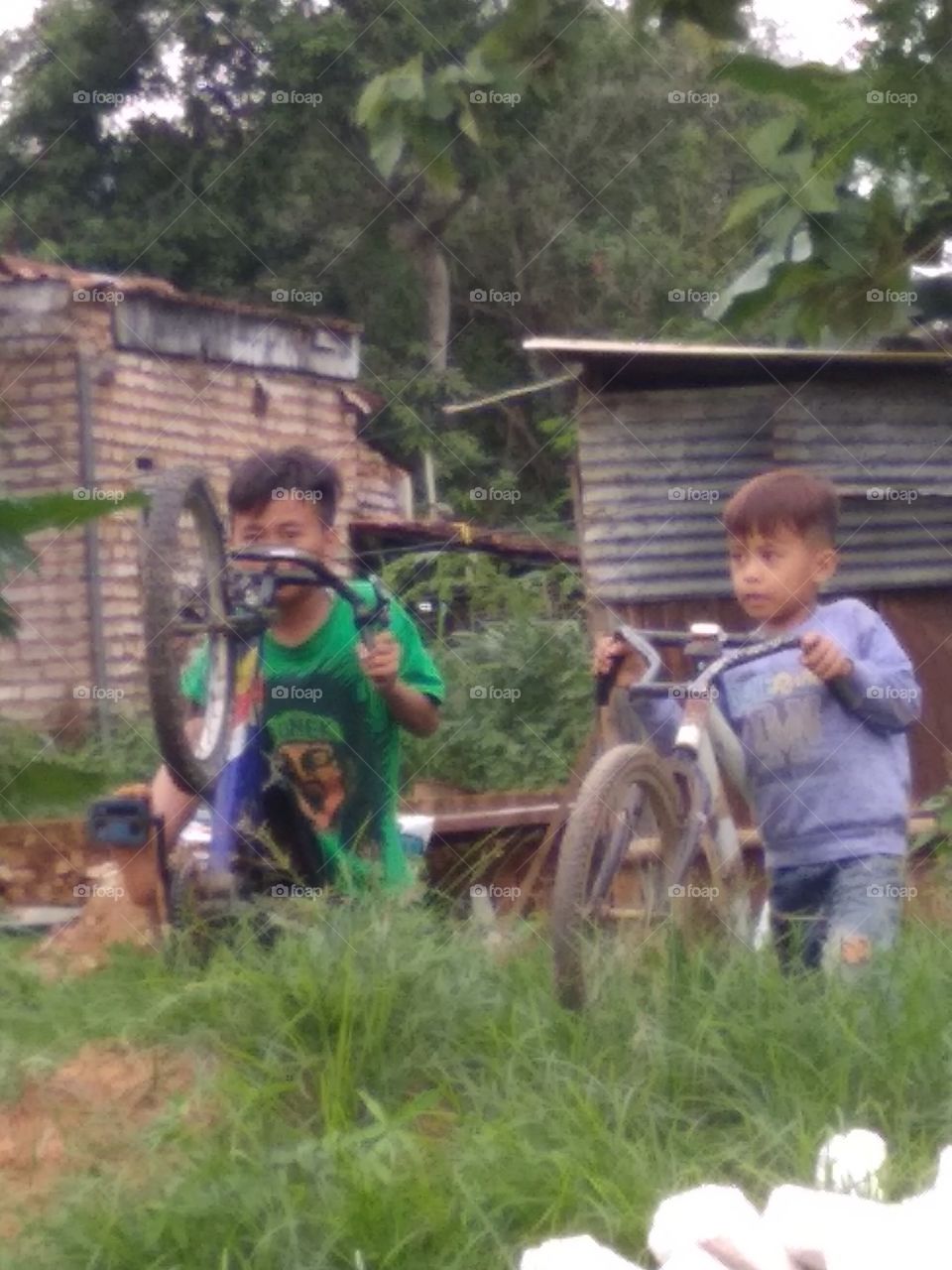 The village boy is happy to play happily