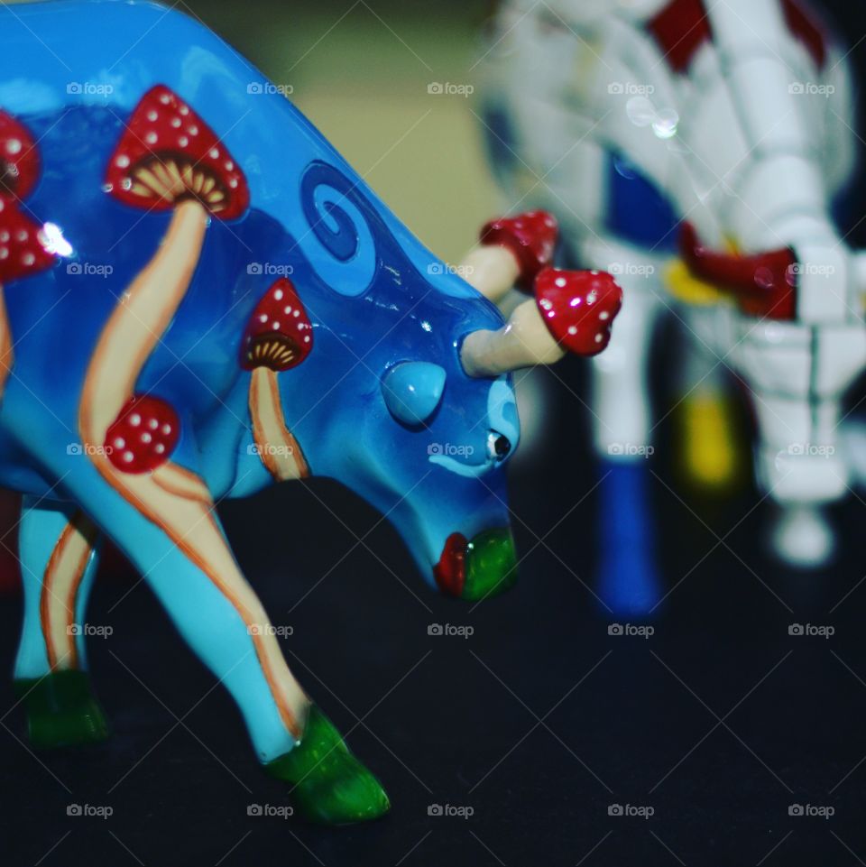 Porcelain cow with fly agaric