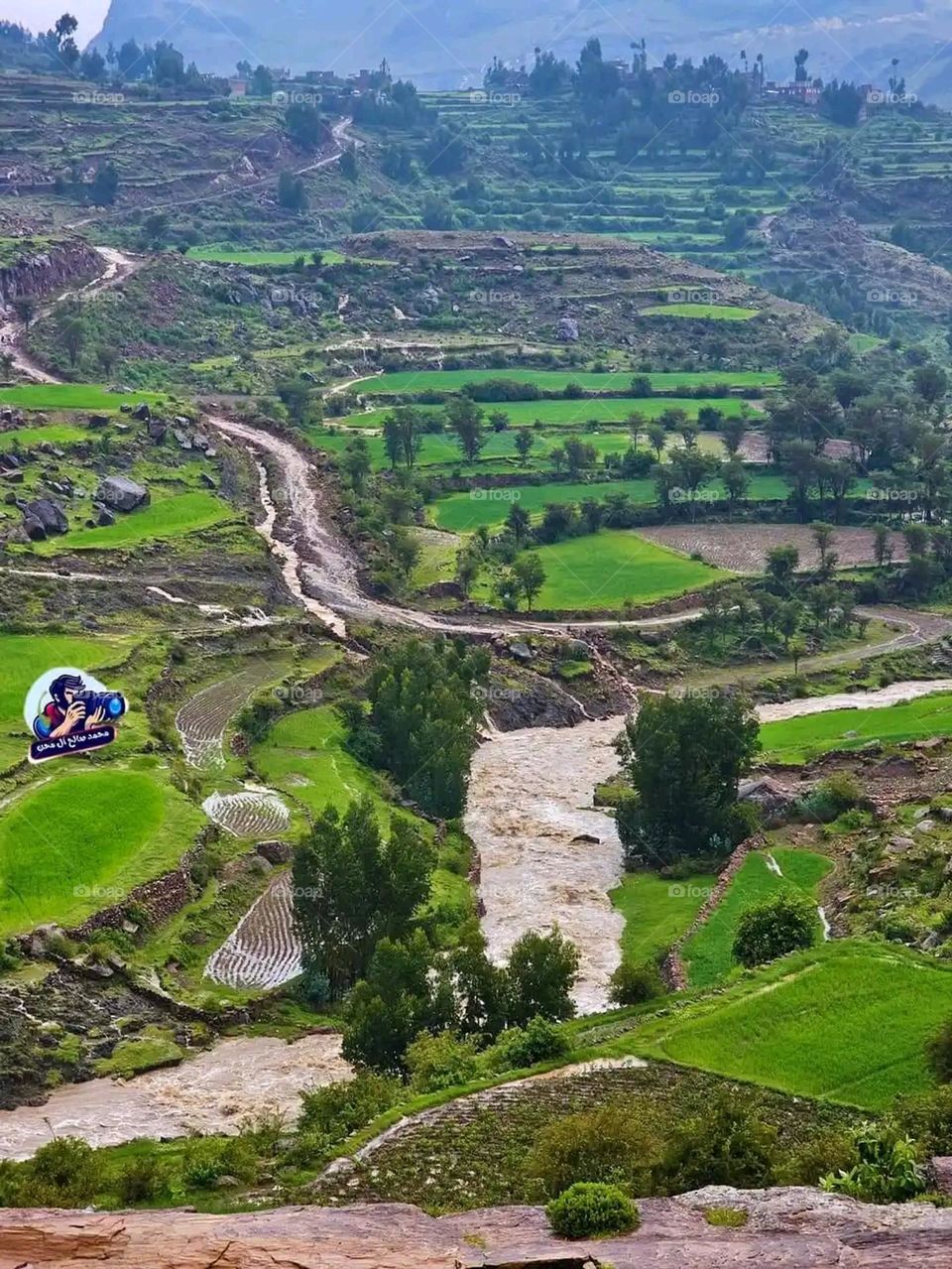 Glory be to God, the magnificent and picturesque view and the natural green trees are a view that is nothing more wonderful than it