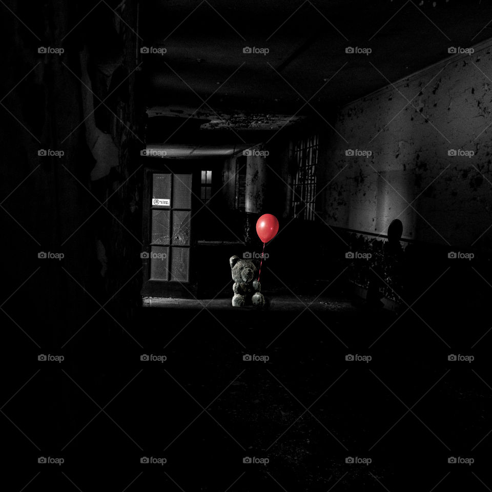 bear with red balloon