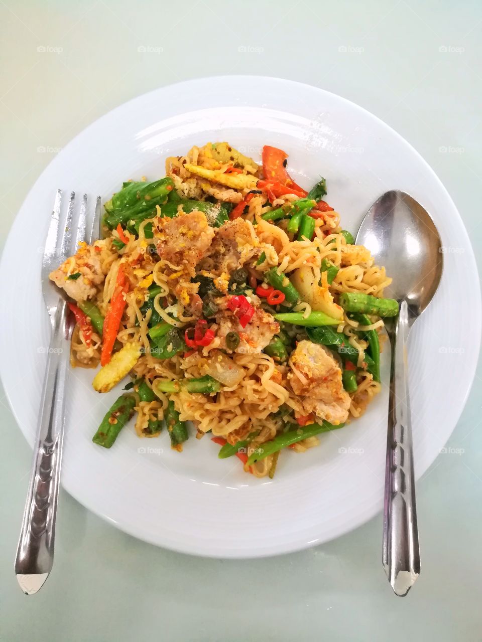 Thai spicy food, Pad kee mao. Spicy Noodle with pork and vegetables.