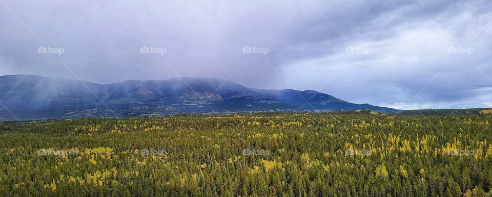 Raining on the distant mountains in the autumn