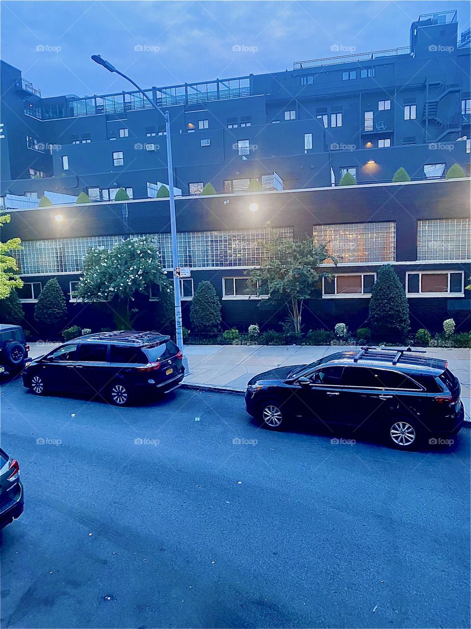 This is the other side of the “BOX HOUSE HOTEL” with back entrance opposite the “Pulaski Bridge” at Newtown Creek” on a warm Indian summer evening in September 2023. Hypnotic Productions