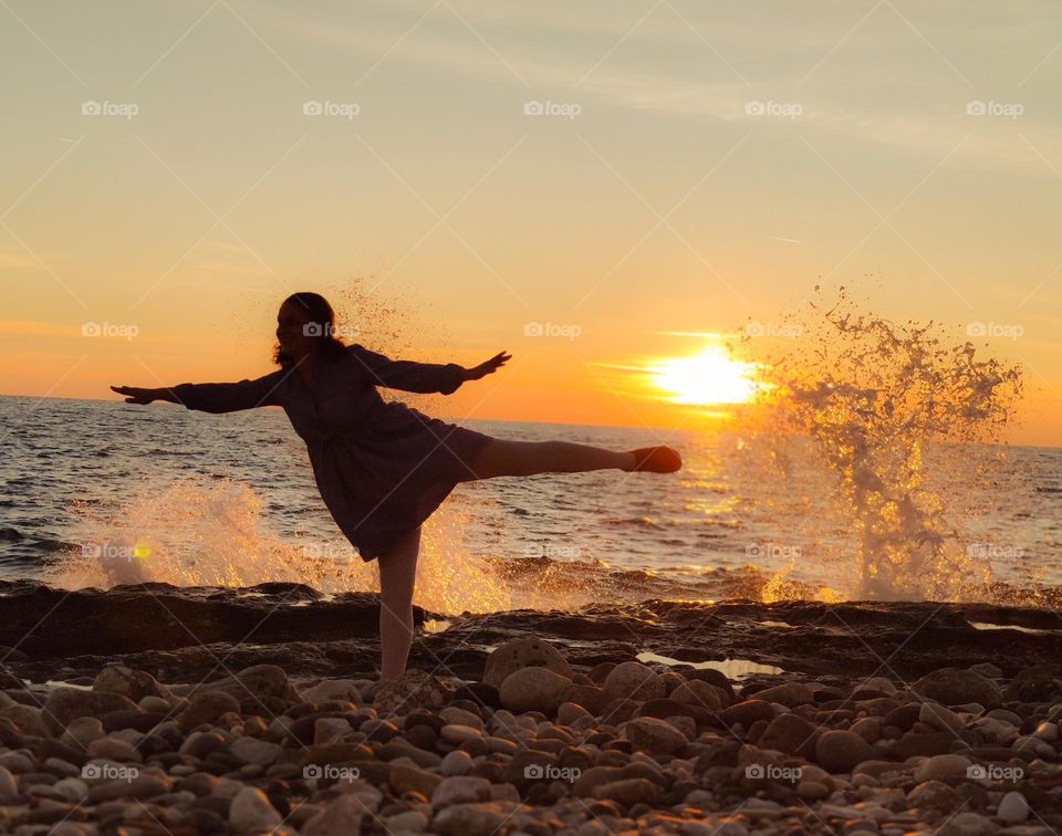 Catching sea waves on the beach