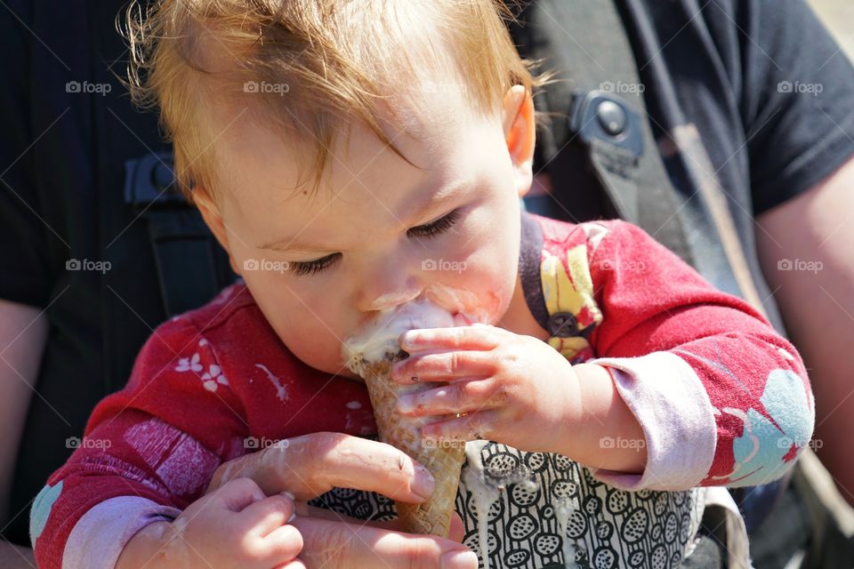 Baby Girl Eating Vanilla Ice Cream