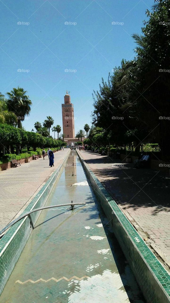 Beautiful and ancient minaret of Kotoubia mosque at marrakech city in Morocco.