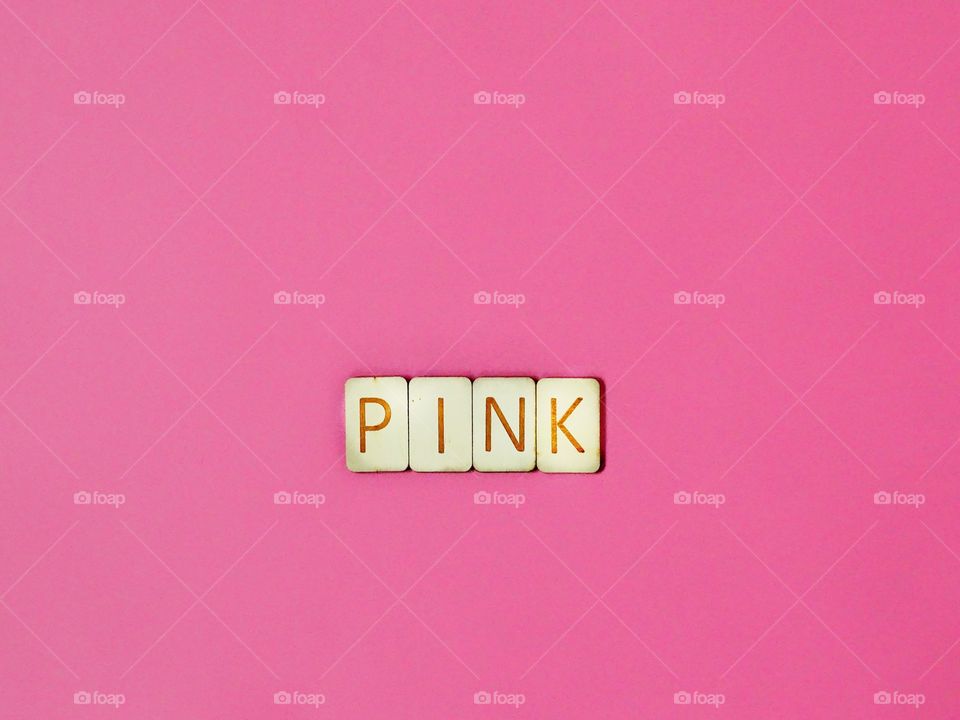 Pink with wooden letters