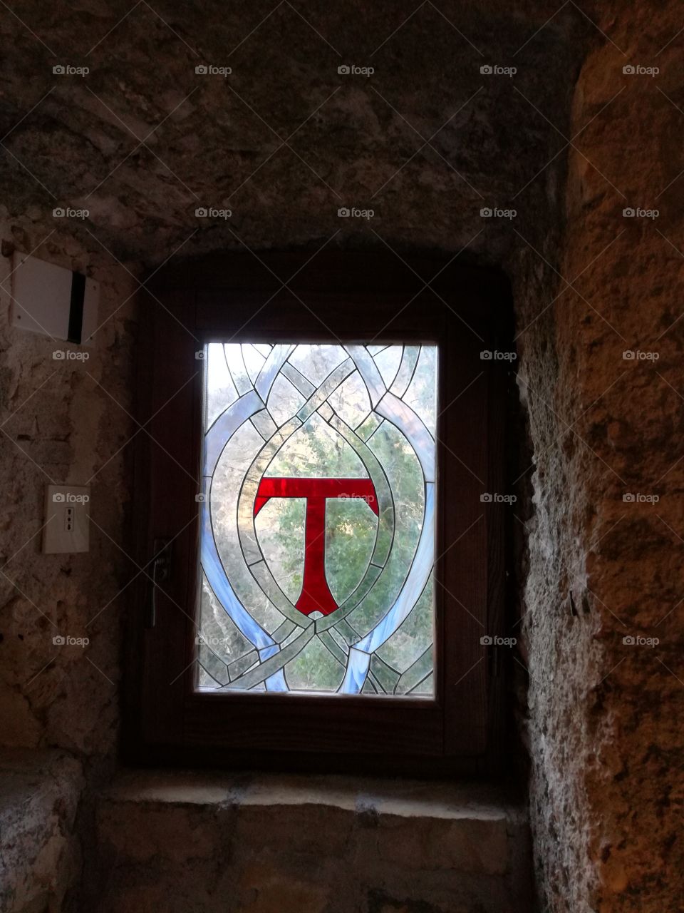 St Francis TAU symbol