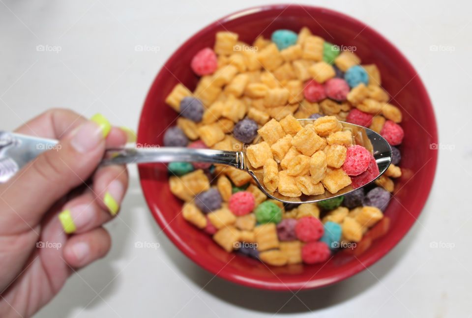 A bowl of brightly colored sugary cereal