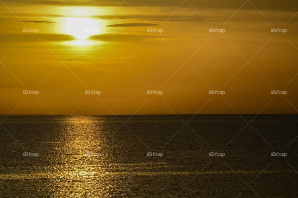 beautiful golden sunset on Sosua beach Dominican Republic
