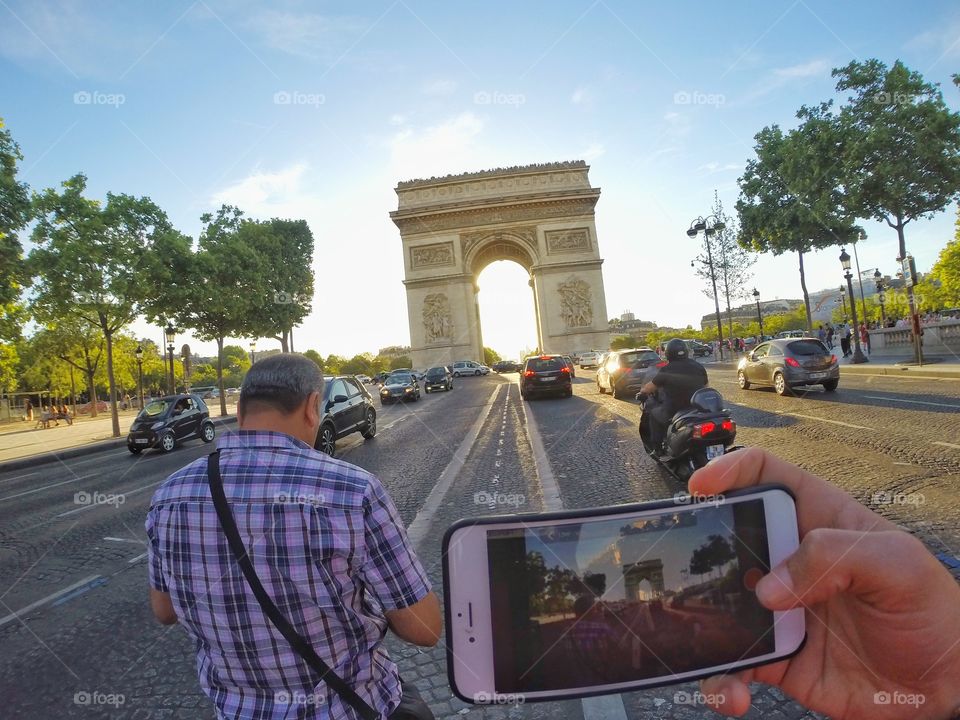 Inception at the Arc . Ready to take a picture of the Arc de Triomphe when someone stepped in front of me to then ask me if I could snap a pic.