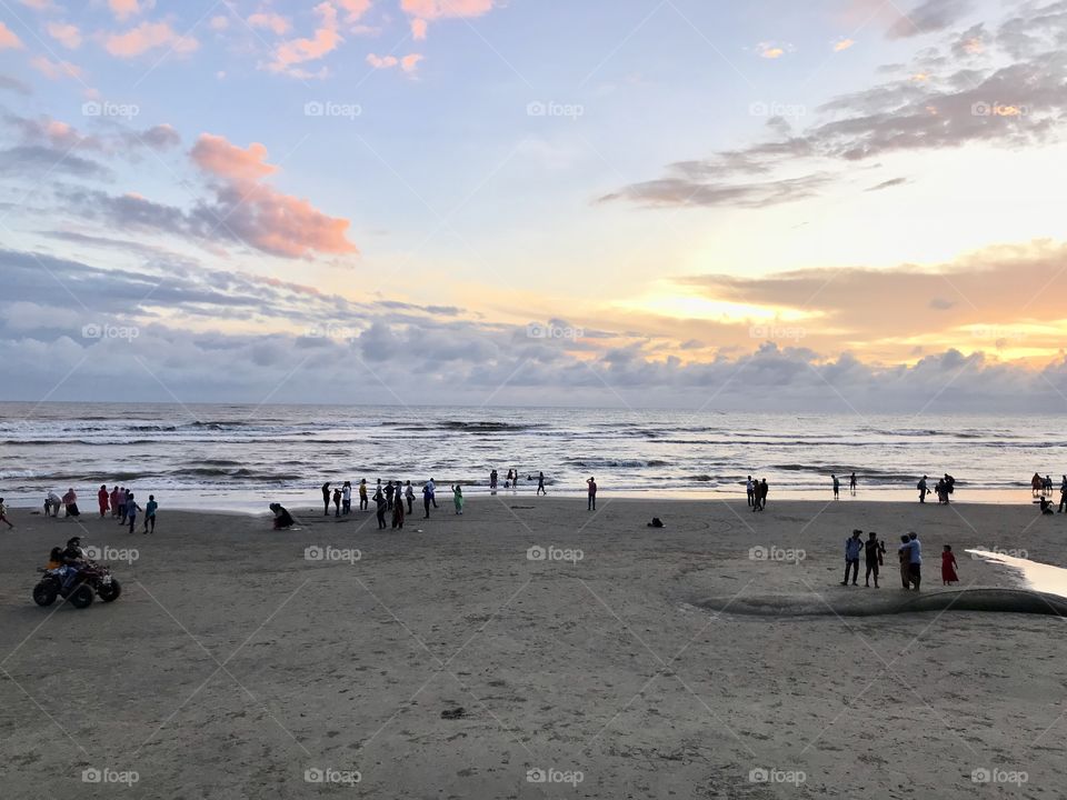 World largest sea beach the Cox’s Bazar.....sun set time... beautiful sky......... land.... water.... sky..... clouds....
