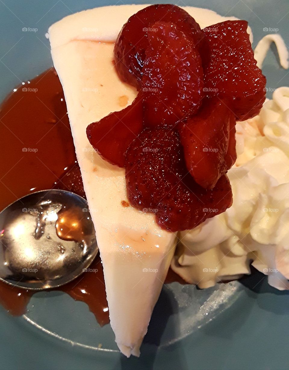 Strawberry Cheesecake On Blue Plate
