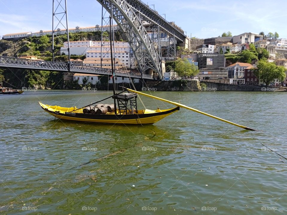 boat under a bridge