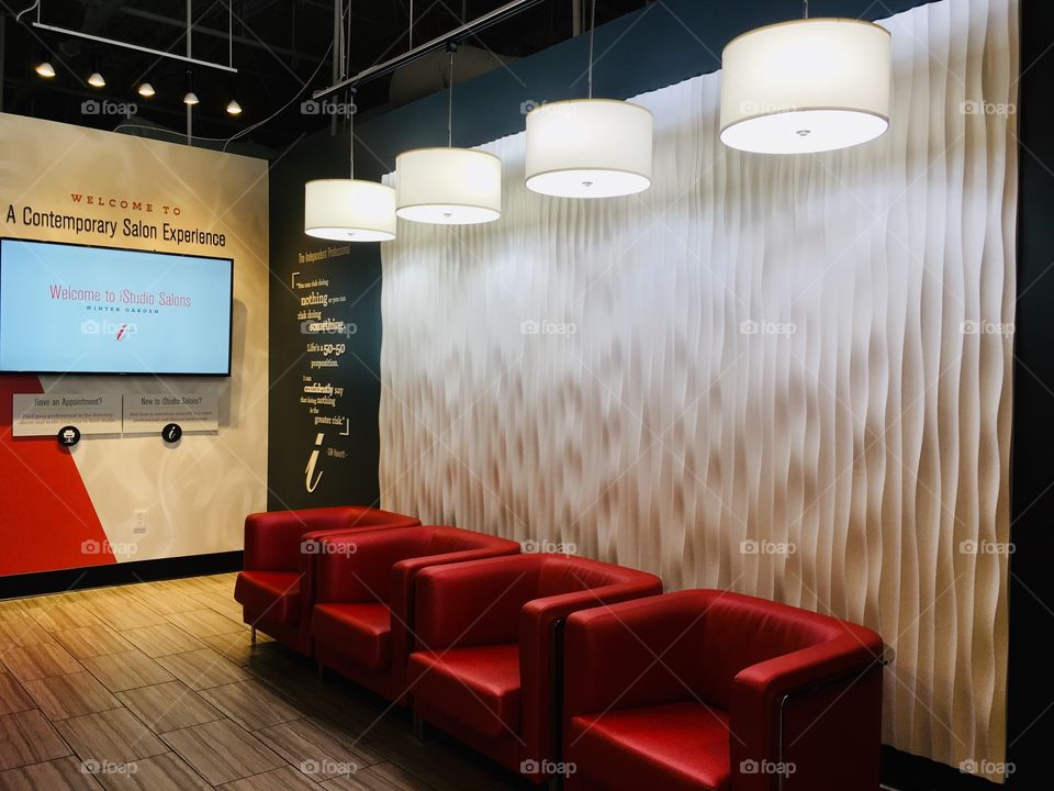 Empty red chairs and lights