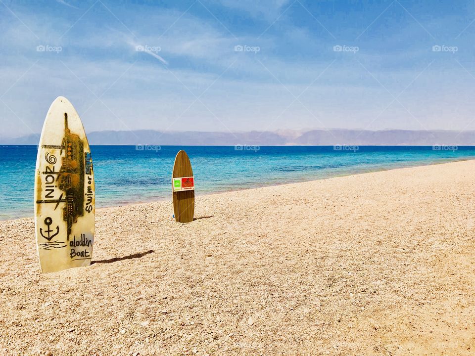 Surface boards on a beach