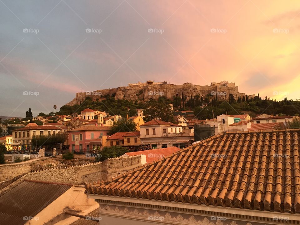 Dinner view of the sun setting over the Acropolis 