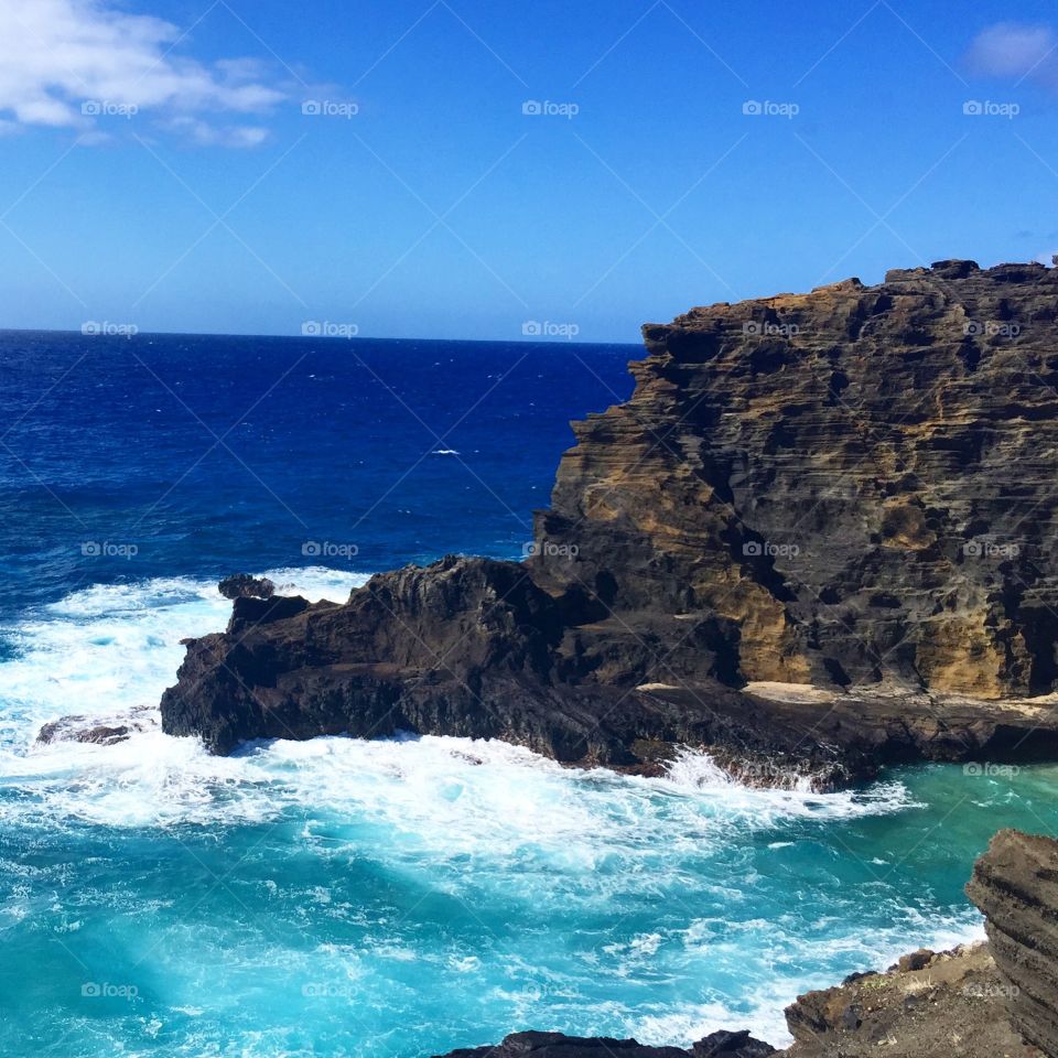 Crashing Waves on Oahu. Waves crashing on rocks in Honolulu, Hawaii