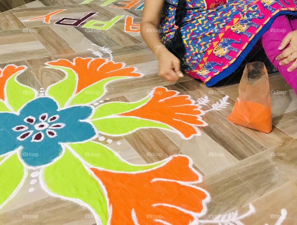 Rangoli design draw at house.