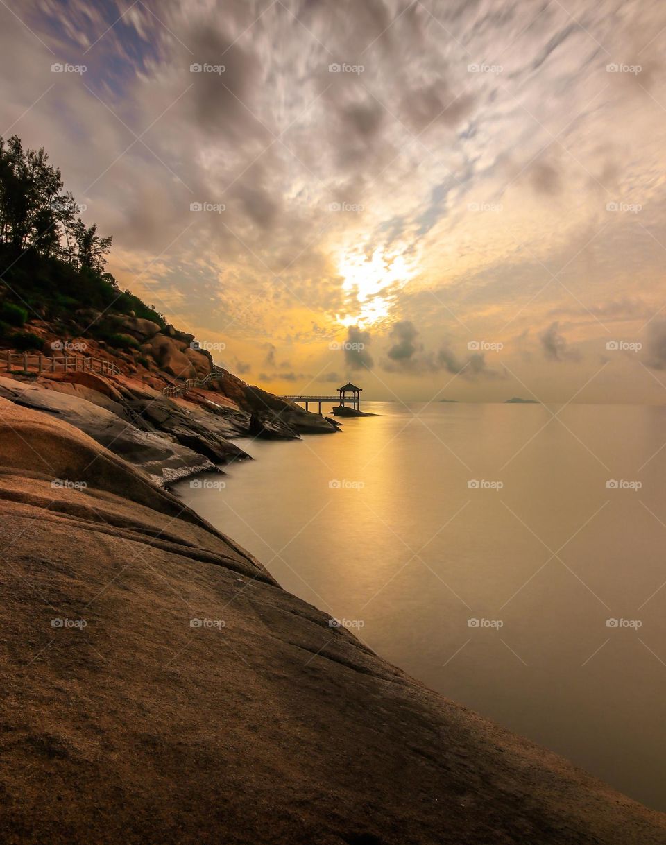 Moment of Sunrise at the rocky coast