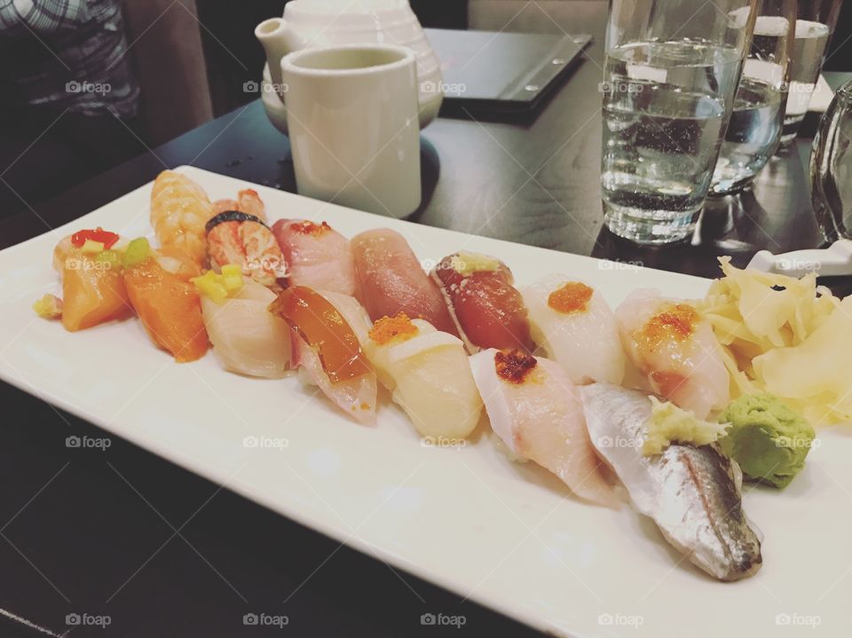Sushi, fish, shrimps, crab, raw fish, Japanese restaurant, salmon, tuna, yellow tail,  scallop, rice,  wasabi, ginger albacore, omakase, chef choice, tea, water 