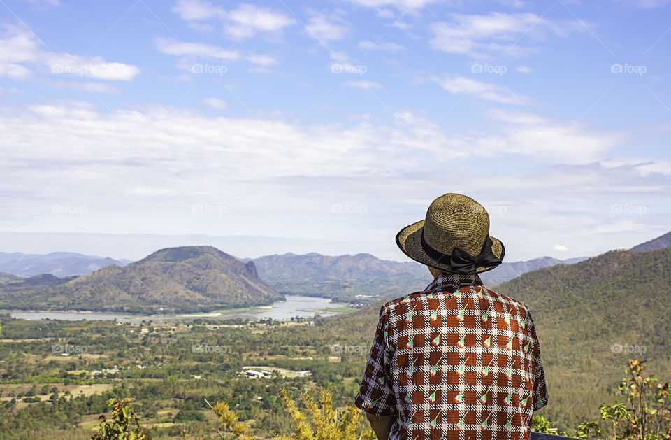 Women see view Mekong River and mountain at  Phu Thok , Loei in Thailand.