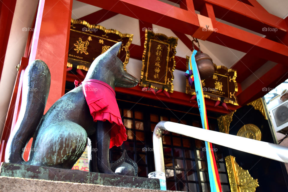 Fox statues at a small shrine in nakano-ku, Tokyo. ( Gosha inari shrine )