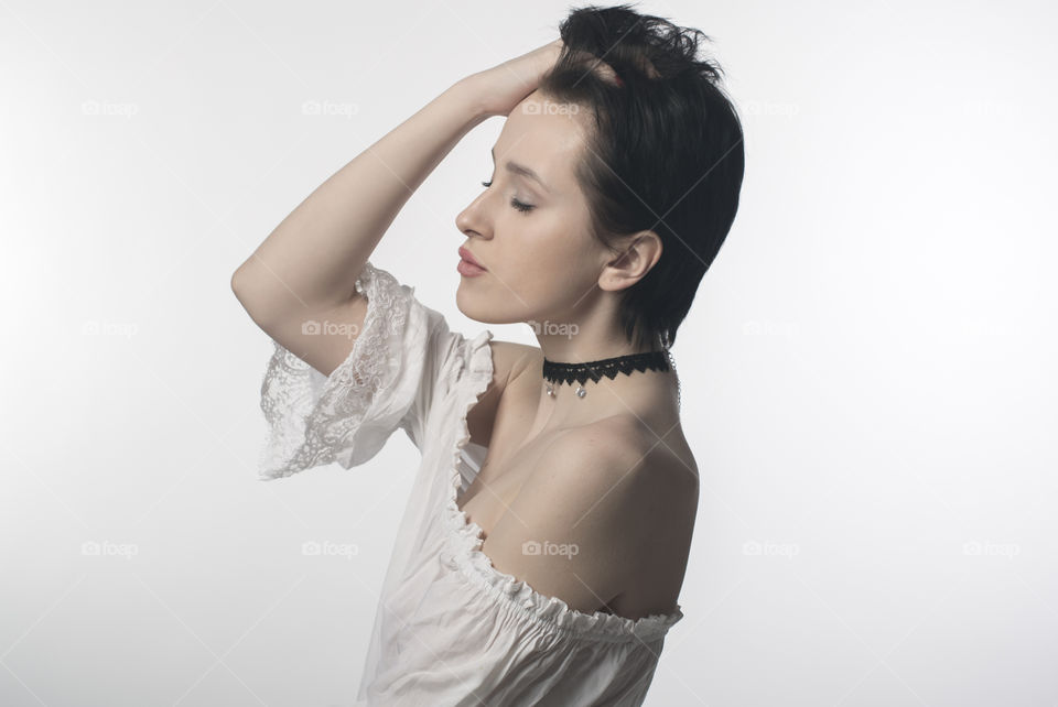 Woman posing on white background