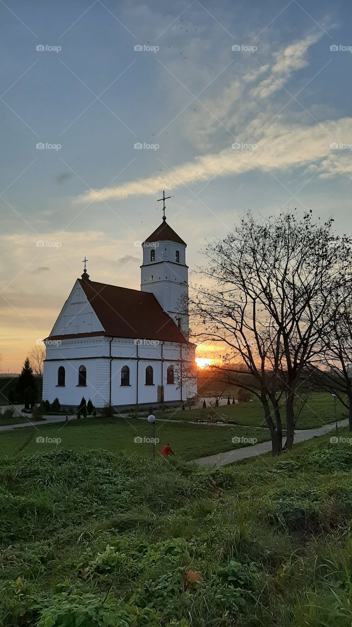 Church on sunset background