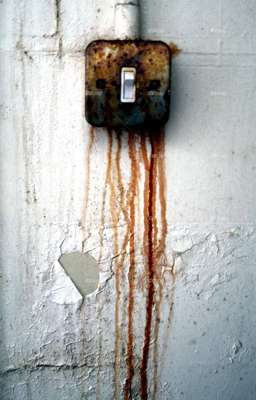 Derelict hospital switch. This rusty switch was found in an abandoned hospital in Lancashire 