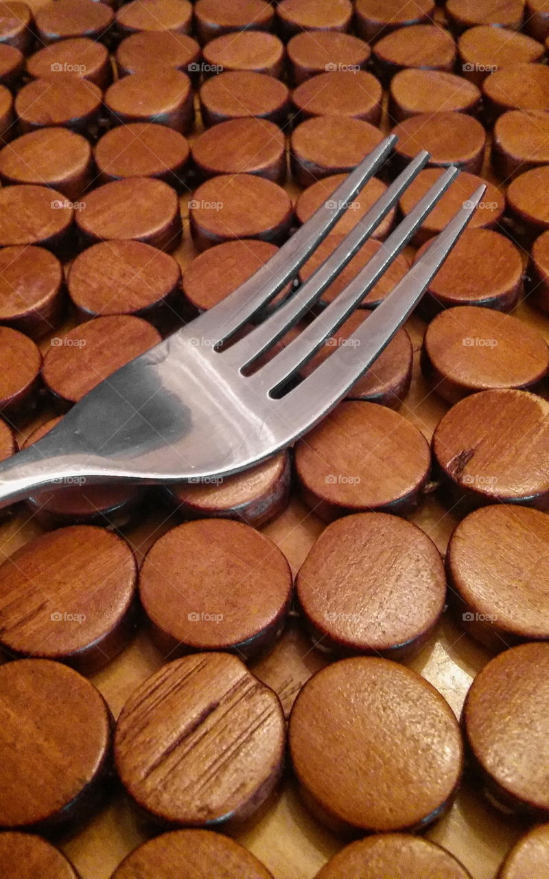Fork on a wooden placemat