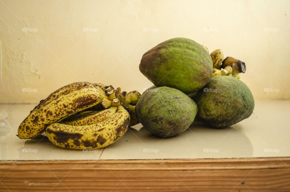 Avocados And Bananas On Counter