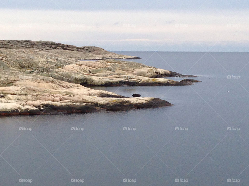 sweden sea horizon rocks by haq