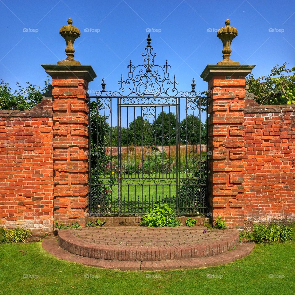 Formal gardens of Packwood House stately home - Warwickshire, England UK. 