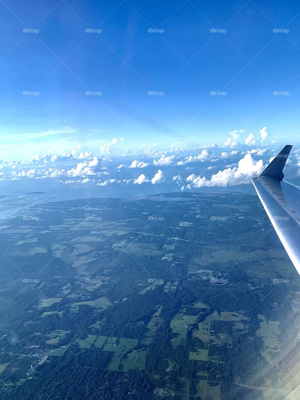 On an airplane ride from a long time ago! I love a good landscape shot, especially one from the sky.