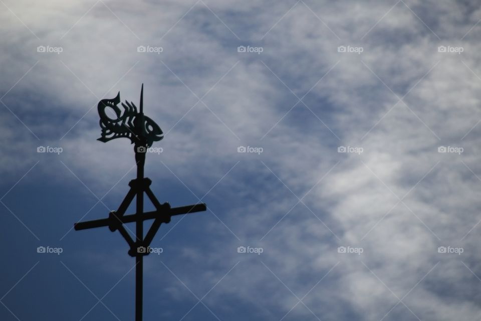 cross on the top of the sky