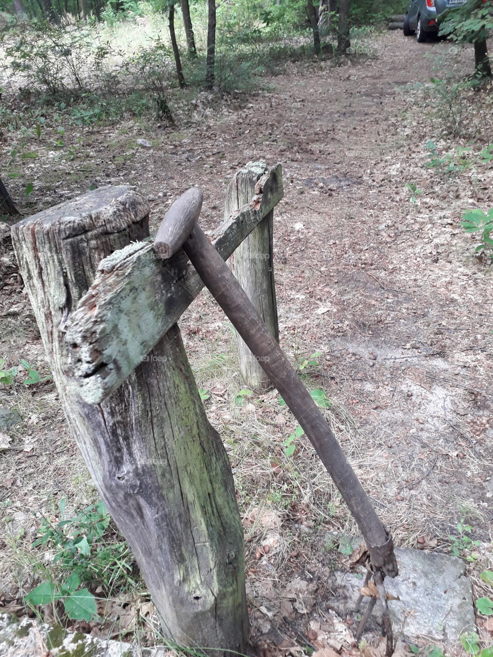 old wooden handrail and pitchfork