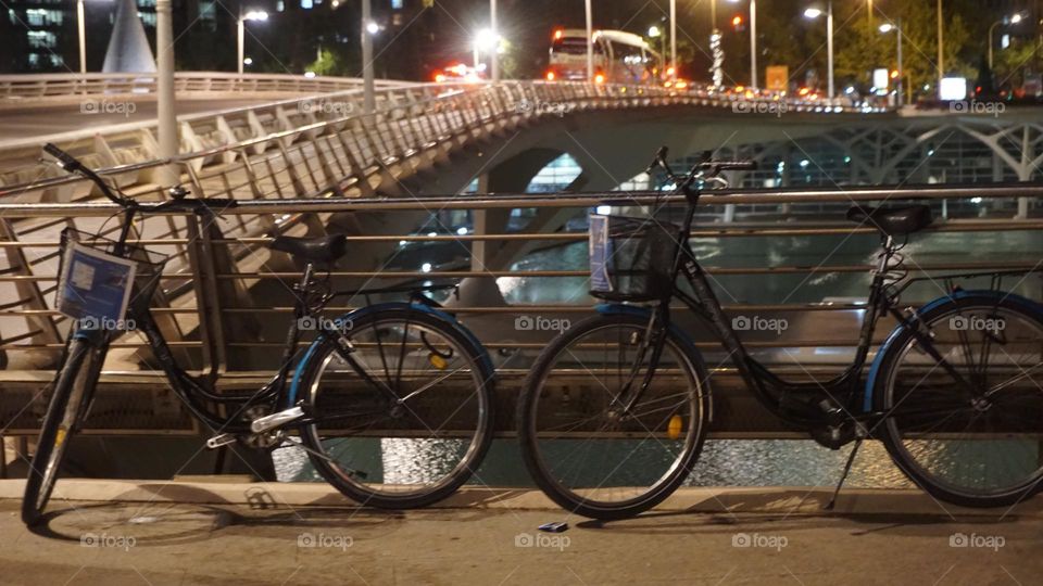 Bycicles#street#bridge#night#city