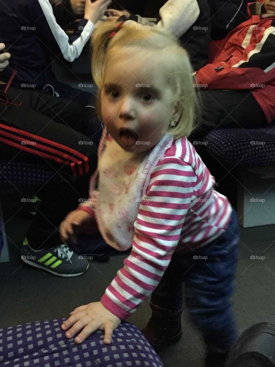 Portrait of little girl with surprise expression