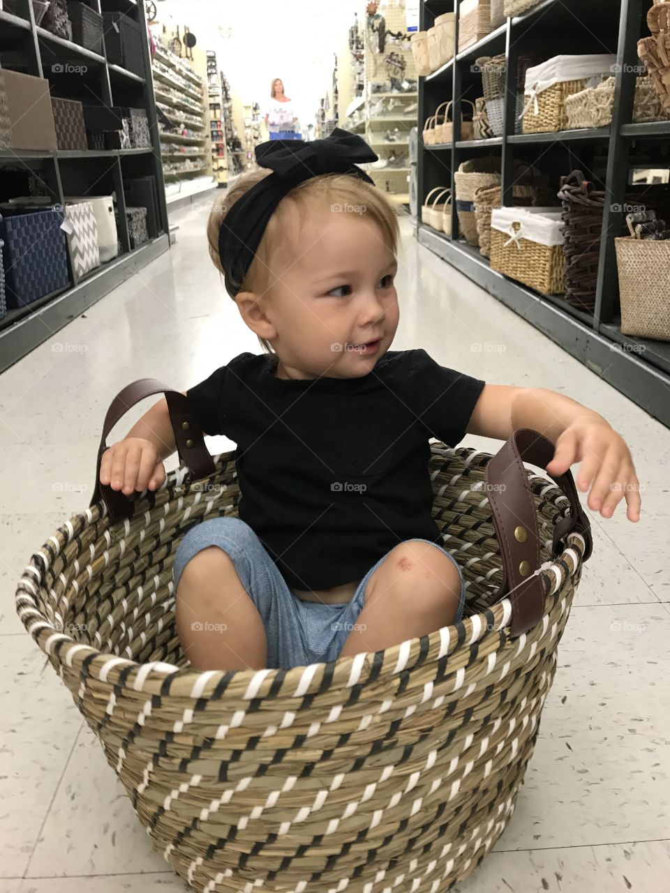 Little girl, big basket 