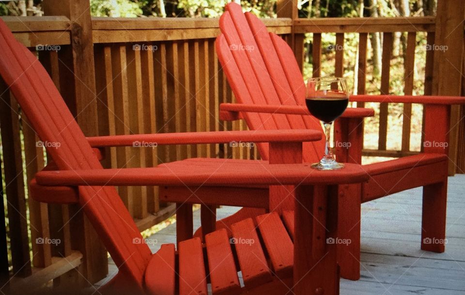 Red Adirondack chairs