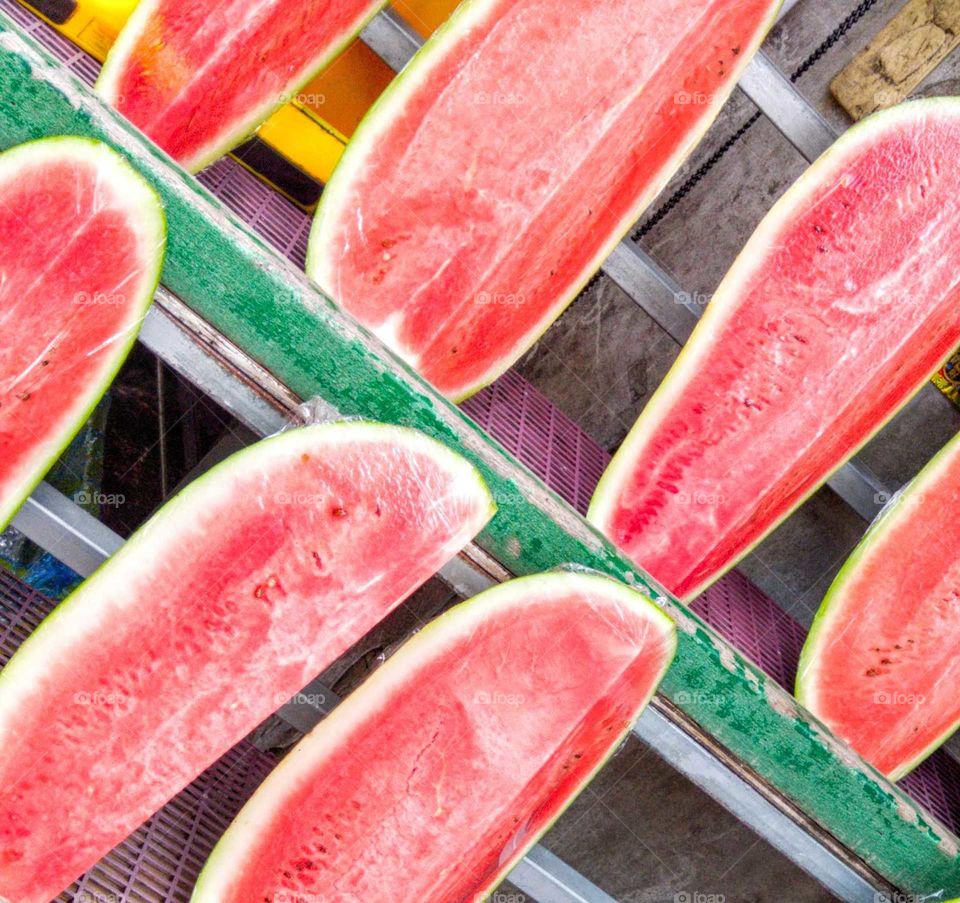 Fruits: beautiful and juicy big  watermelon red pulp. tasty and attractive in summer. water and vitamin c are very good to health.