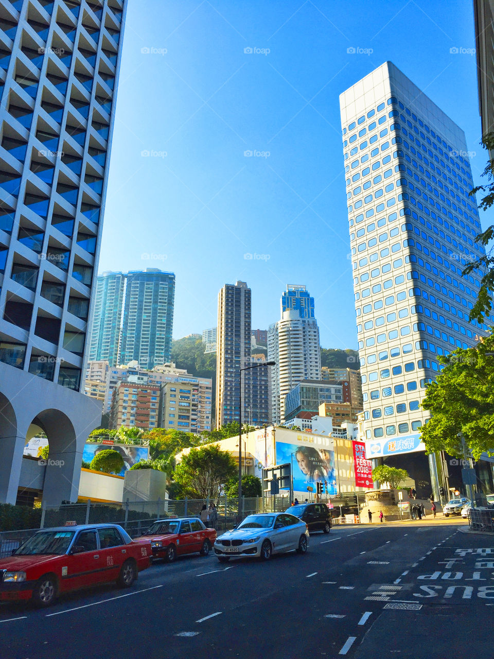 Central busy streets and skyscrapers in Hong Kong 