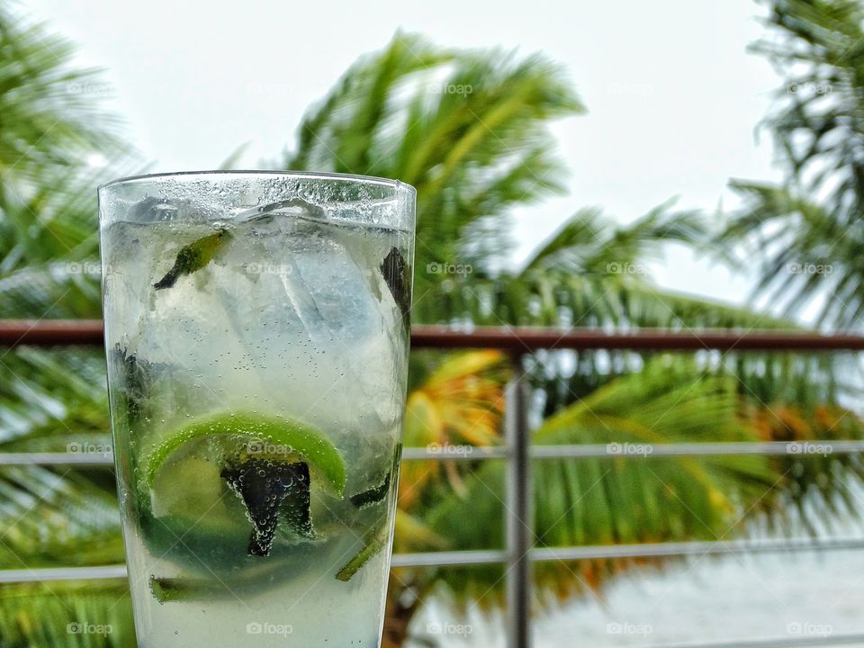 Mojito In The Tropics. Refreshing Mojito Cocktail On The Beach In Cancún

