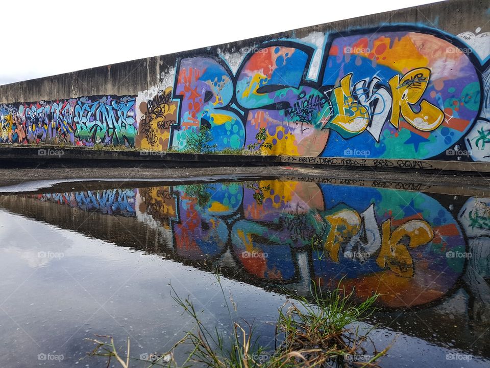 urban playground, colorful vivid street art graffiti reflection