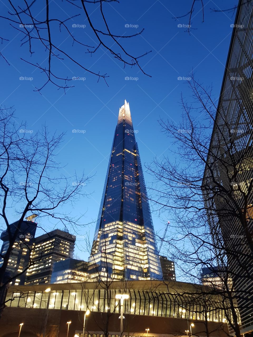 The Shard skyscraper is the tallest building in the UK. Here it is illuminated on a winter evening.