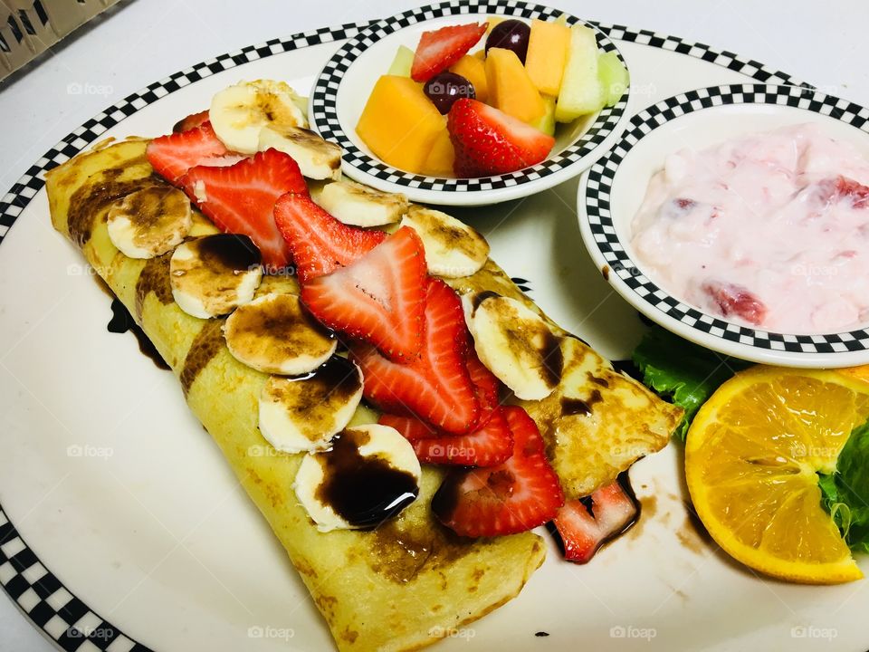 Strawberry and banana crepes! Deliciousness 😋