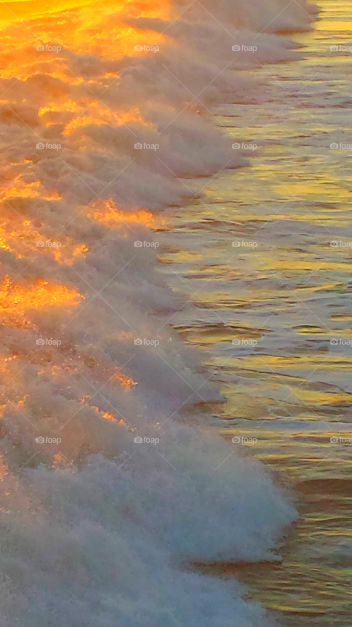 "Crashing Waves At Sunset"
